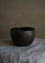 Iron-black textured chawan tea bowl