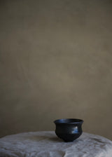 Black wood-fired teacup