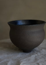 Charcoal and black chawan