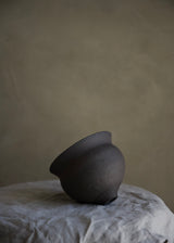 Charcoal and black chawan